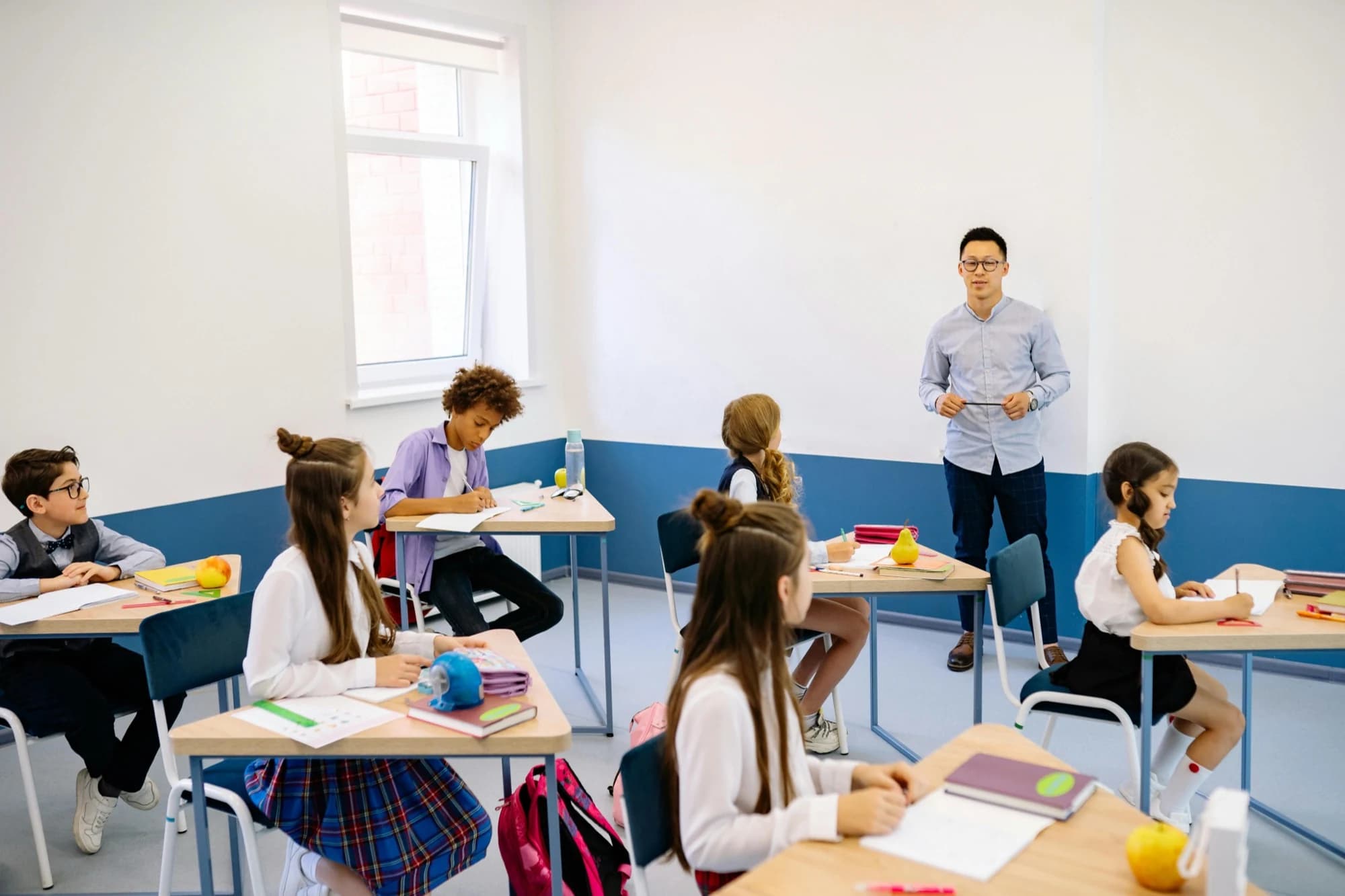 A school administrator in a classroom